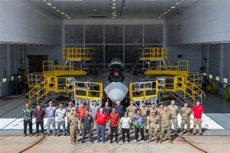 Hawaii Air National Guard airmen performing maintenance on an F-22 Raptor aircraft